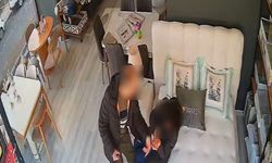 Eşini mobilya mağazasında darbetti