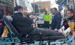 Motosiklet sürücüsü otomobile çarpmaktan kaçarken düştü ve yaralandı