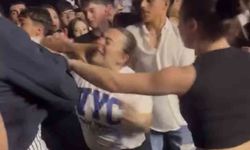 Konserde kargaşa: yumruklar havada uçuştu