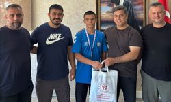 İl Müdürü Öztürk, Türkiye Şampiyonu Yaman'ı Ağırladı