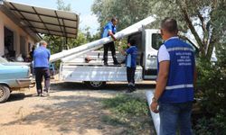 Muğla Büyükşehir, sel mağduru çiftçilere sera naylonu yardımı yapıyor