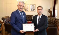 Tuğgeneral Mustafa Tetik'e veda ziyareti ve başarı belgesi