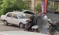Kuryenin Boynunda Lastik Taşıdığı Anlar Kameralara Yansıdı