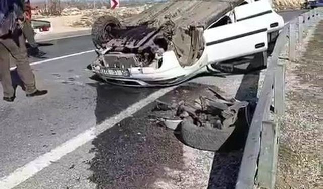 Takla atan otomobilden yara almadan kurtuldu